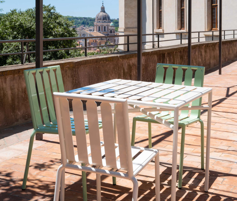 White stackable stainless steel chair