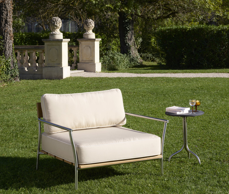 Table d'appoint en inox poli et plateau en granit